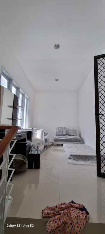 dijual rumah di pakuwon city surabaya timur