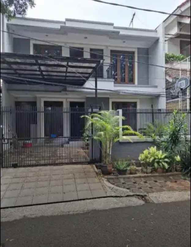 dijual rumah jl pinang perak pondok