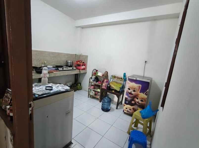dijual rumah perum swan menganti park