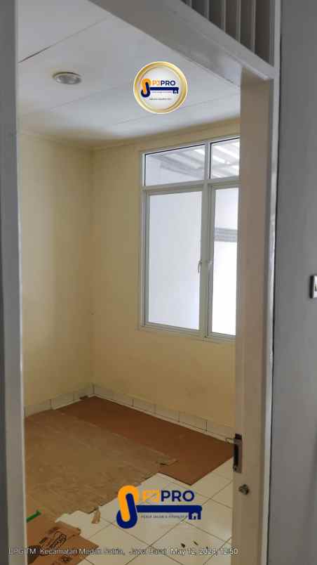 dijual rumah taman harapan baru