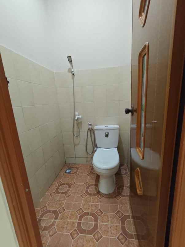 dijual rumah taman harapan baru