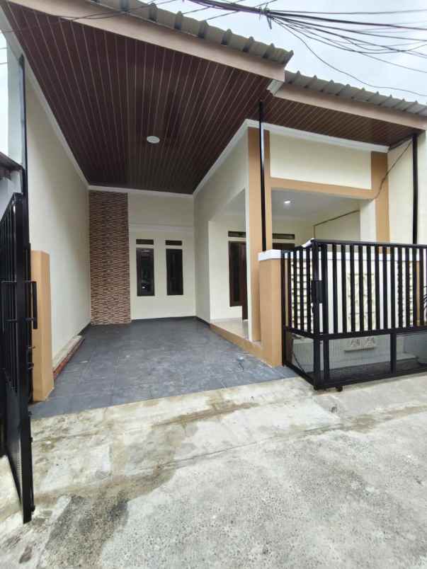 dijual rumah taman harapan baru