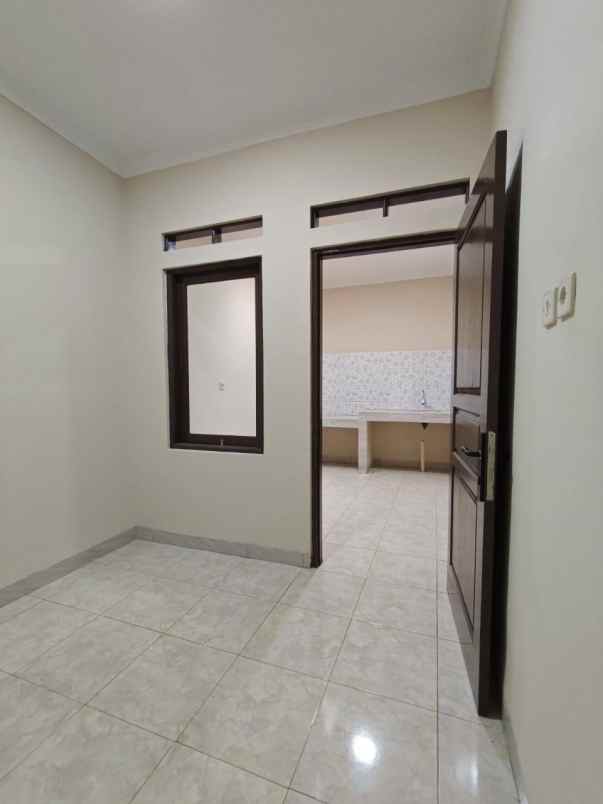 dijual rumah taman harapan baru