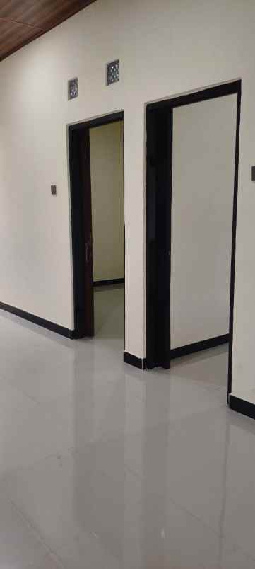 dijual rumah wiguna selatan