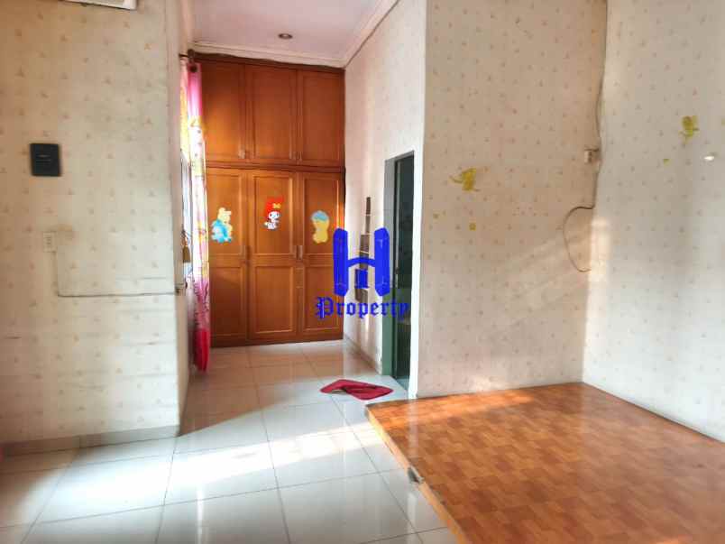 disewakan rumah komplek cemara hijau jalan