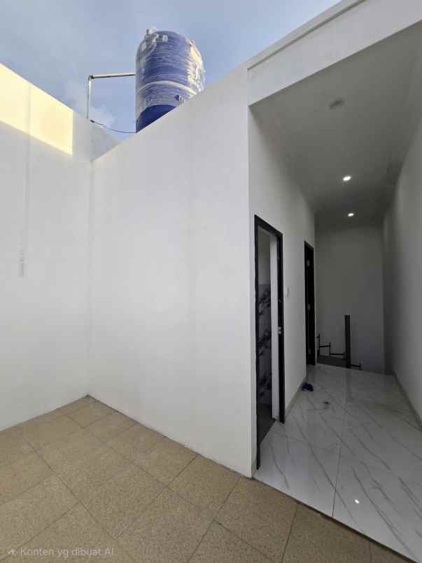 rumah baru dalam komplek dengan akses jalan lebar