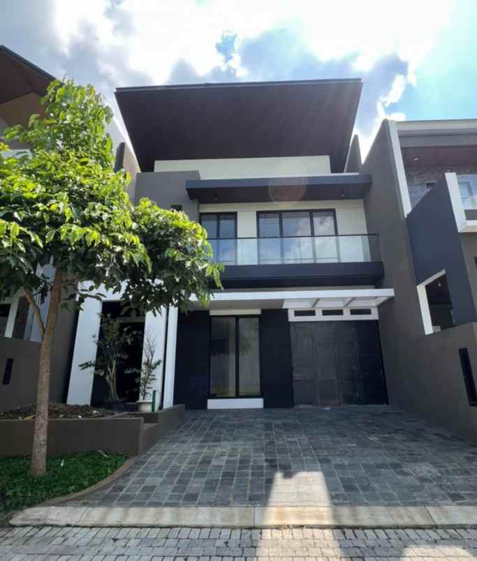 rumah dijual woodland citraland utama surabaya barat
