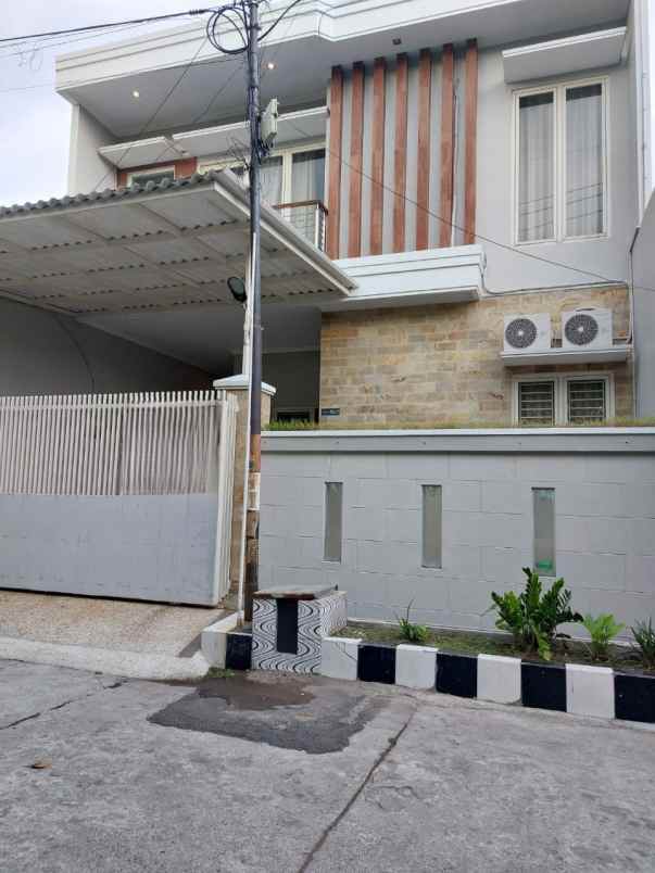 rumah minimalis 2 lantai wisma permai surabaya timur