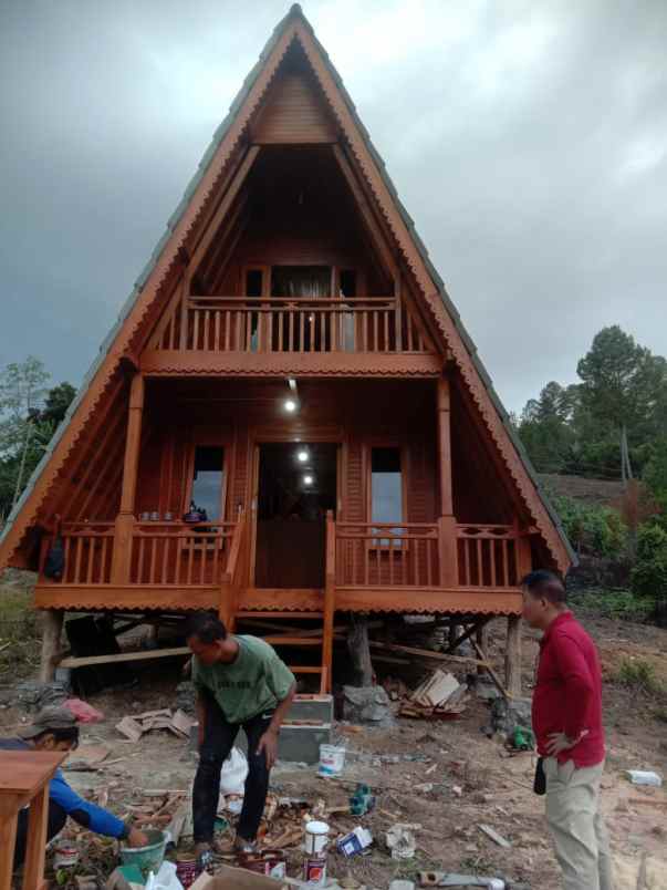 rumah segitiga 2 lantai