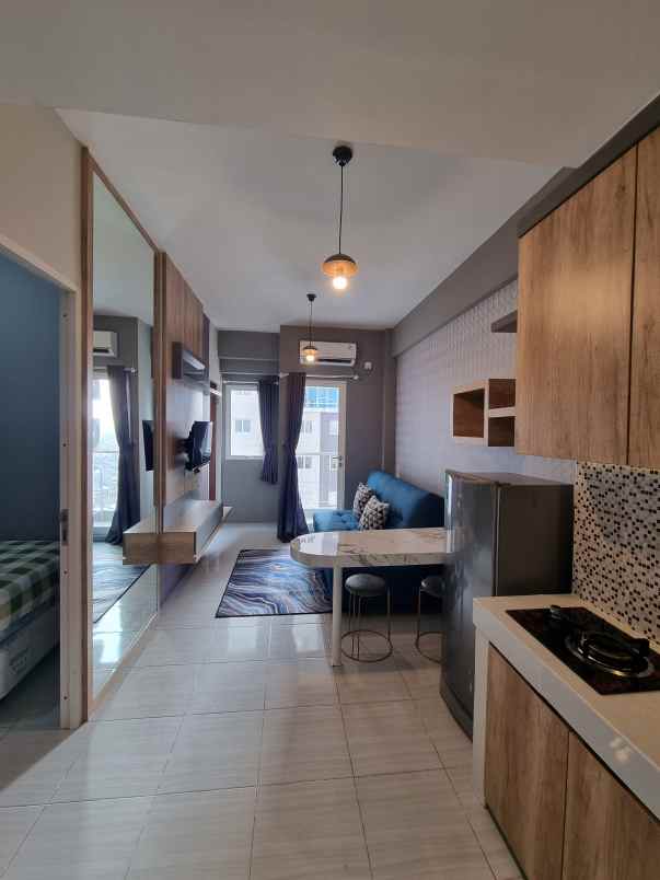 apartemen puncak dharmahusada tipe 2br lantai