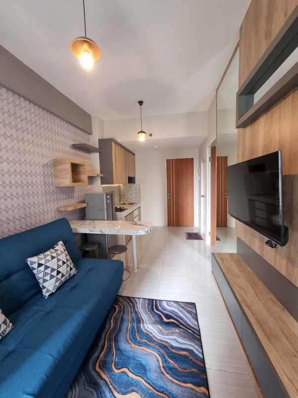 apartemen puncak dharmahusada tipe 2br lantai