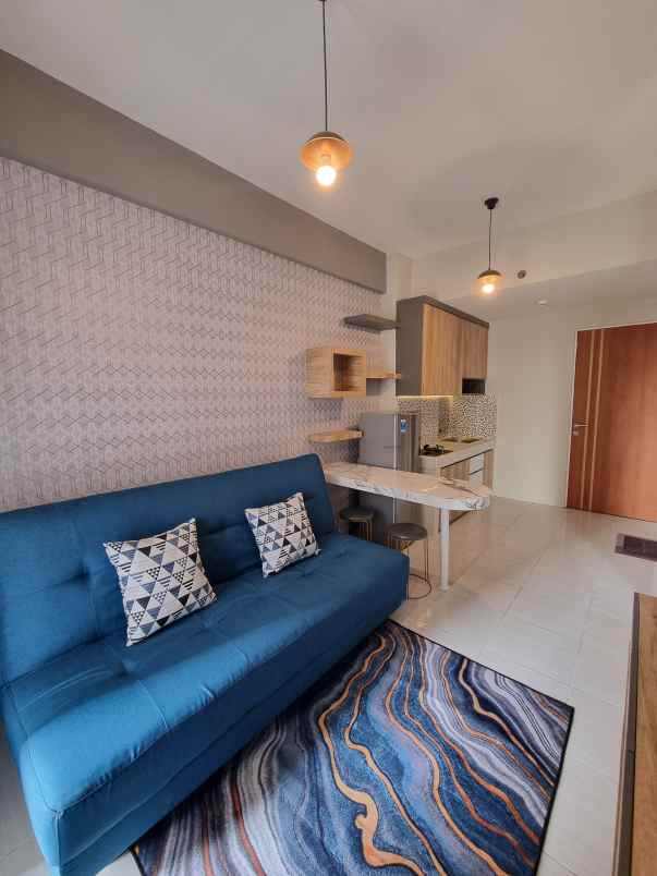 apartemen puncak dharmahusada tipe 2br lantai