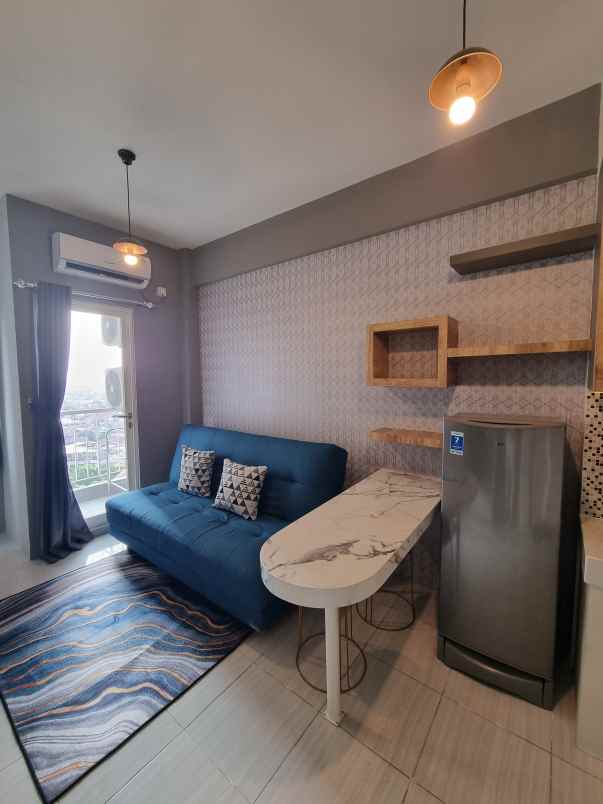 apartemen puncak dharmahusada tipe 2br lantai