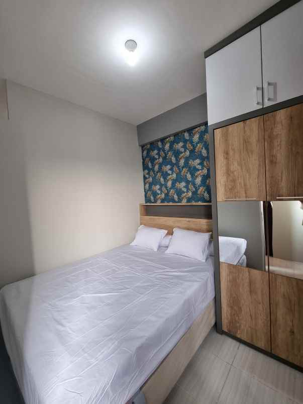 apartemen puncak dharmahusada tipe 2br lantai