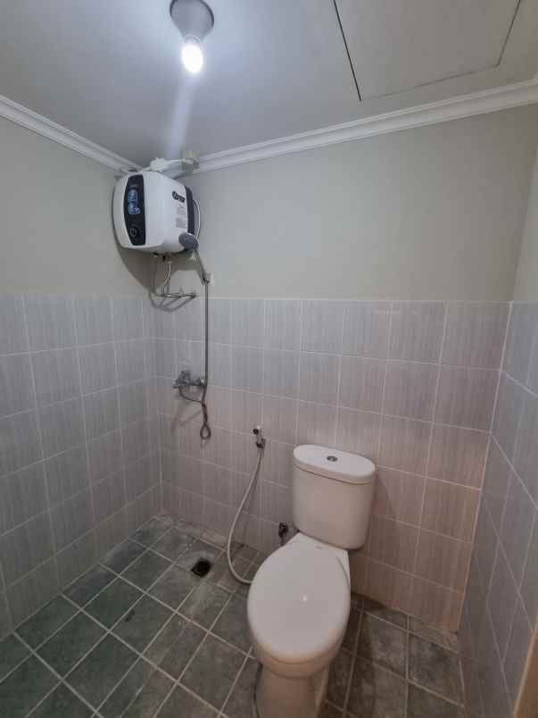 apartemen puncak dharmahusada tipe studio