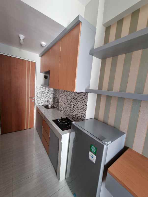 apartemen puncak dharmahusada tipe studio