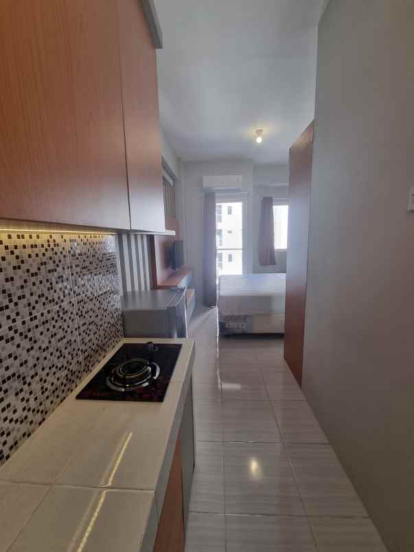 apartemen puncak dharmahusada tipe studio