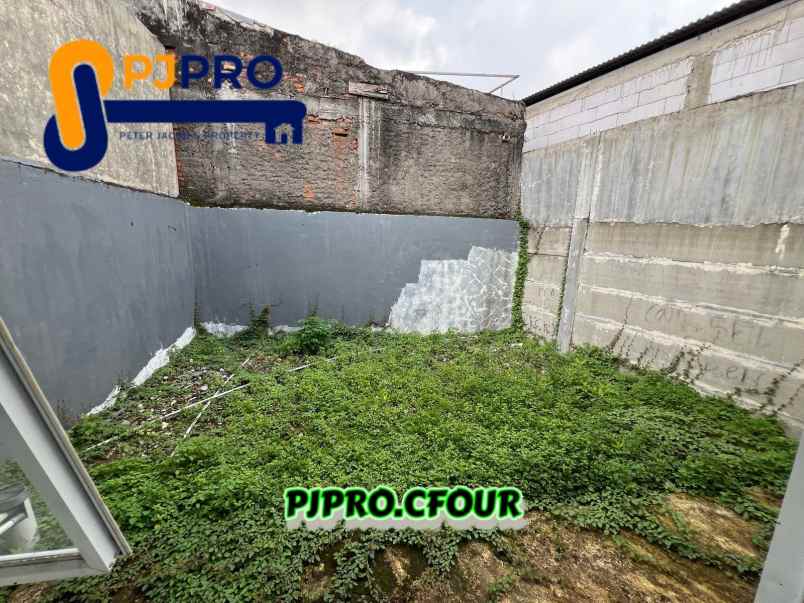 dijual rumah cluster duta bumi 1