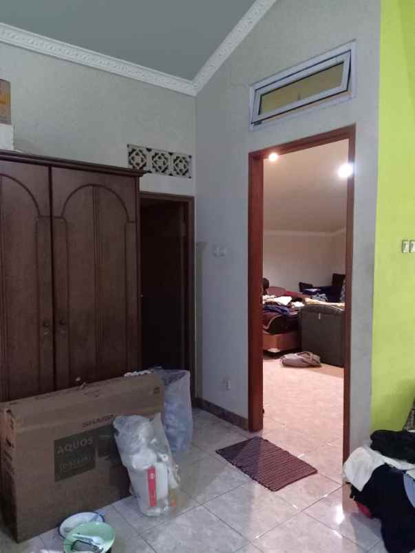dijual rumah cluster harapan indah