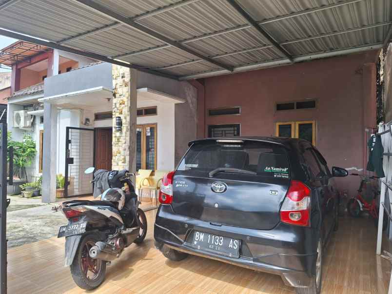 dijual rumah jl bukit barisan