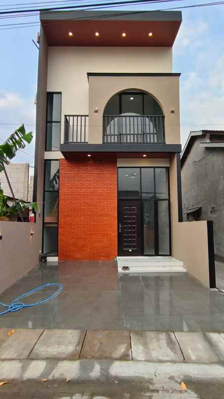 dijual rumah jl jaten lll wolter mongonsidi