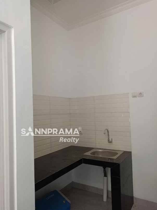 dijual rumah jln raya tapos depok