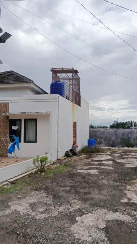 dijual rumah perum gerbera indah