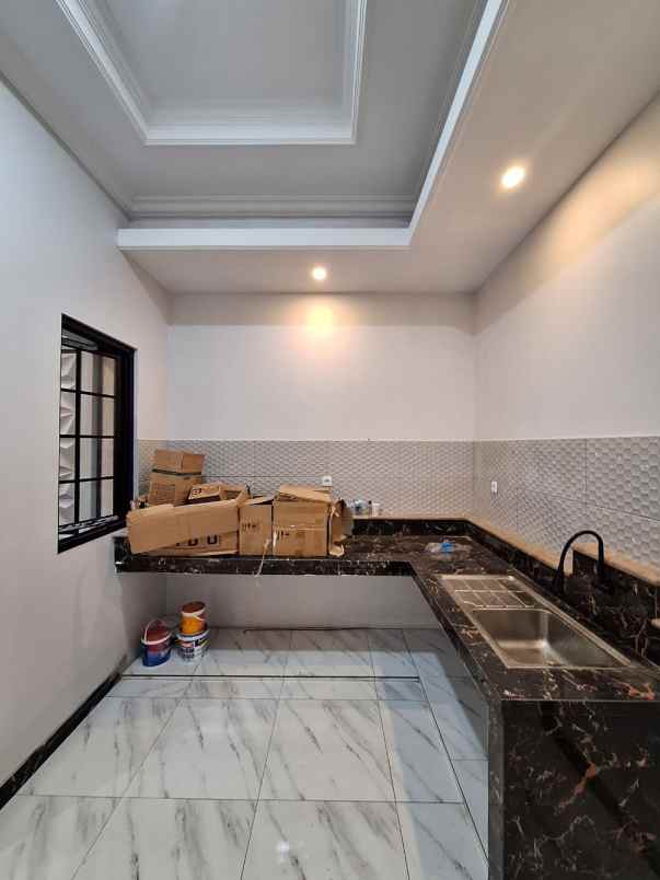 rumah cluster 6 unit tanpa dp bebas banjir depok