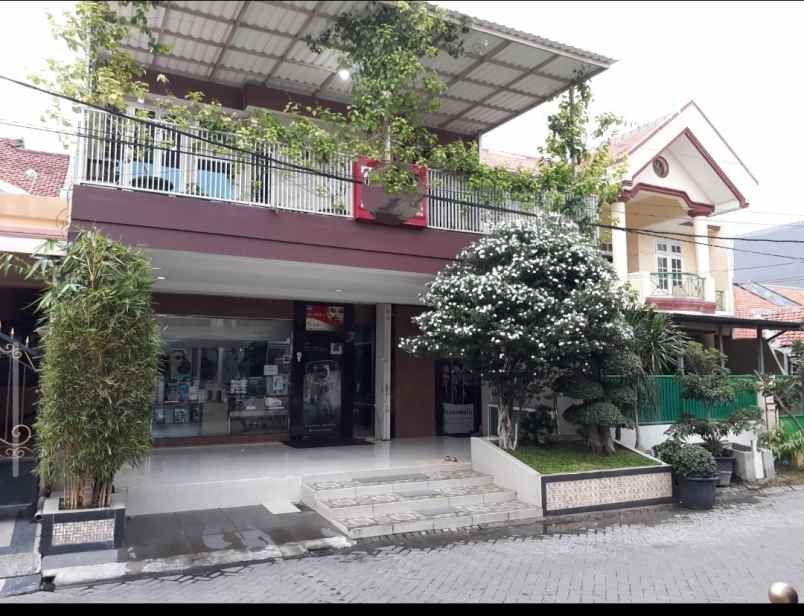 rumah dan usaha optik