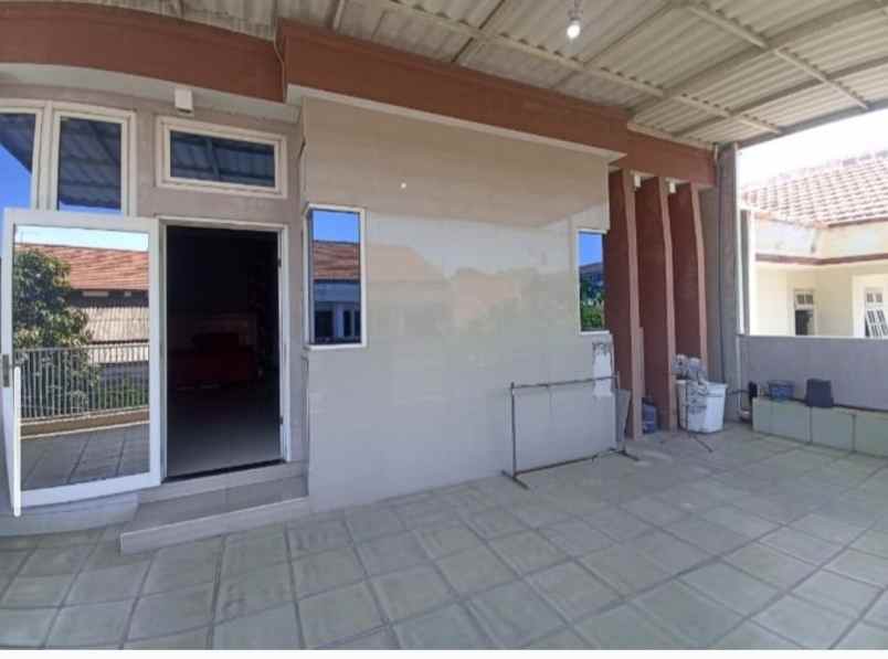 rumah dan usaha optik