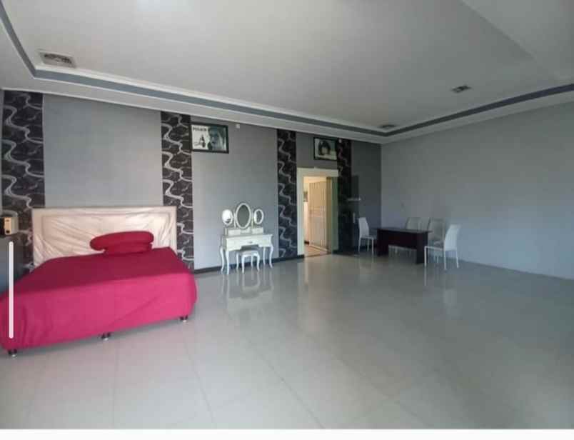 rumah dan usaha optik
