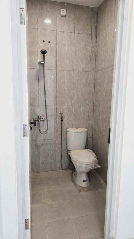 rumah dijual taman puspa raya citraland surabaya barat