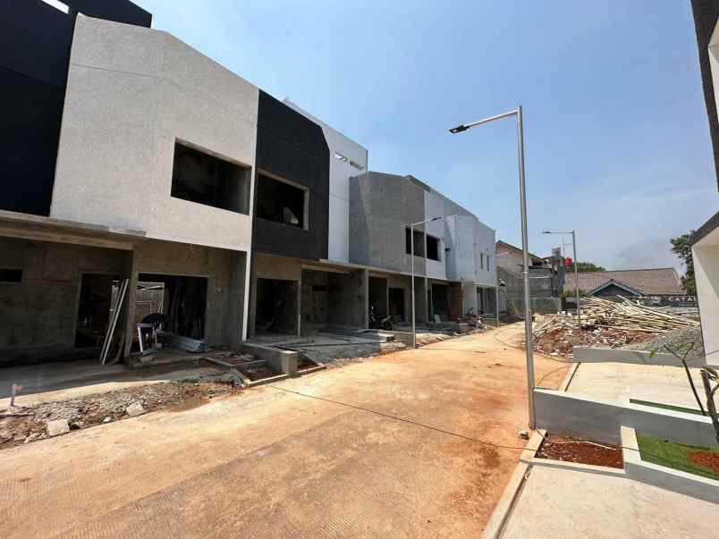 rumah strategis 2 5lt rooftop di pondok melati bekasi
