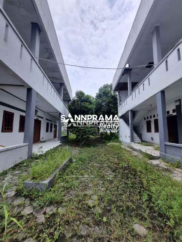tanah dan bangunan eks sekolah 1919m2 kalimulya