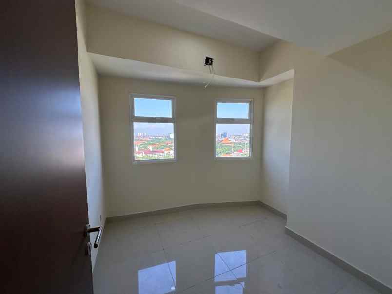 dijual apartemen grand dharmahusada lagoon