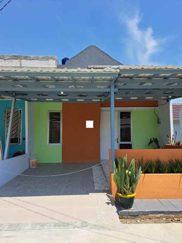 dijual rumah cluster madrid mutiara