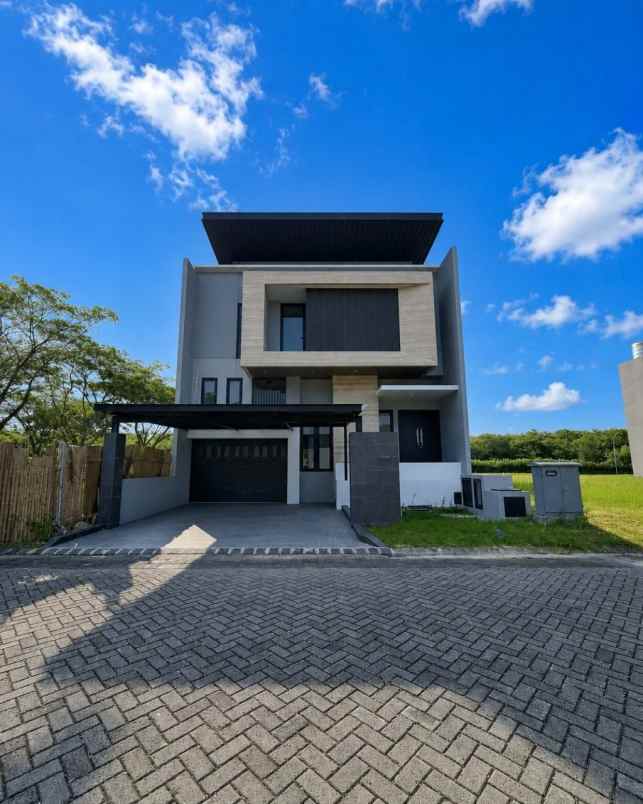 dijual rumah grand island pakuwon city