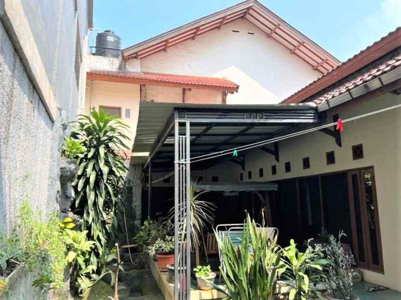 dijual rumah jalan raya jati makmur