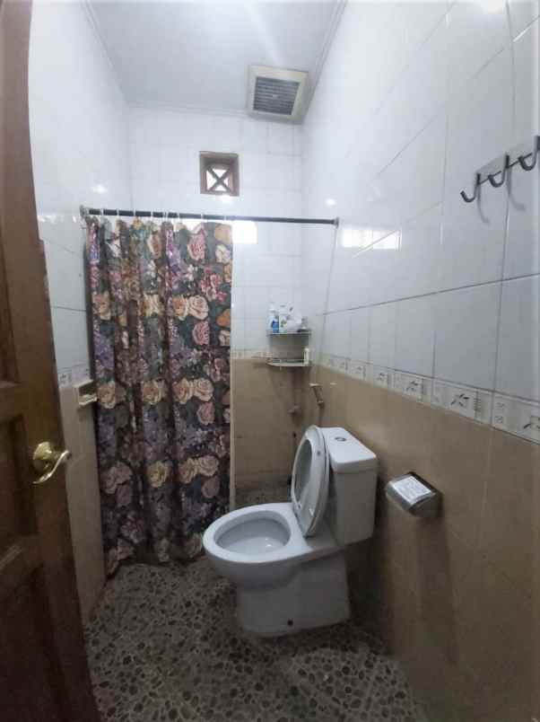 dijual rumah jalan raya jati makmur