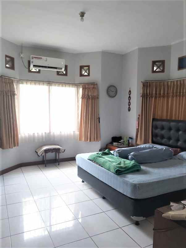 dijual rumah jalan raya jati makmur