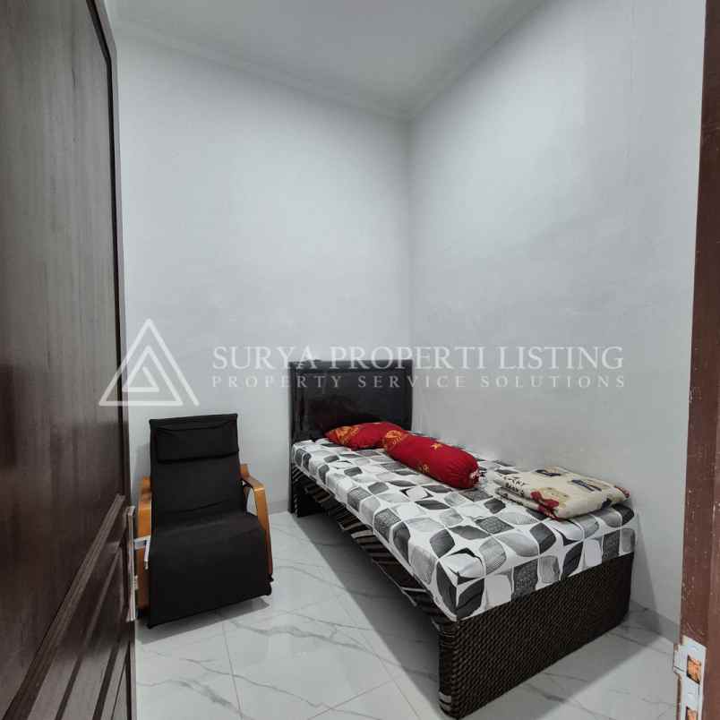 dijual rumah jl surya haji komplek