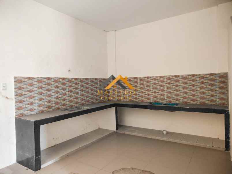 dijual rumah komplek cemara asri