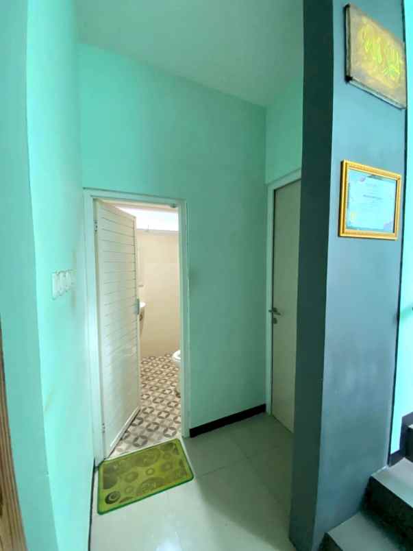 dijual rumah springhills sawojajar