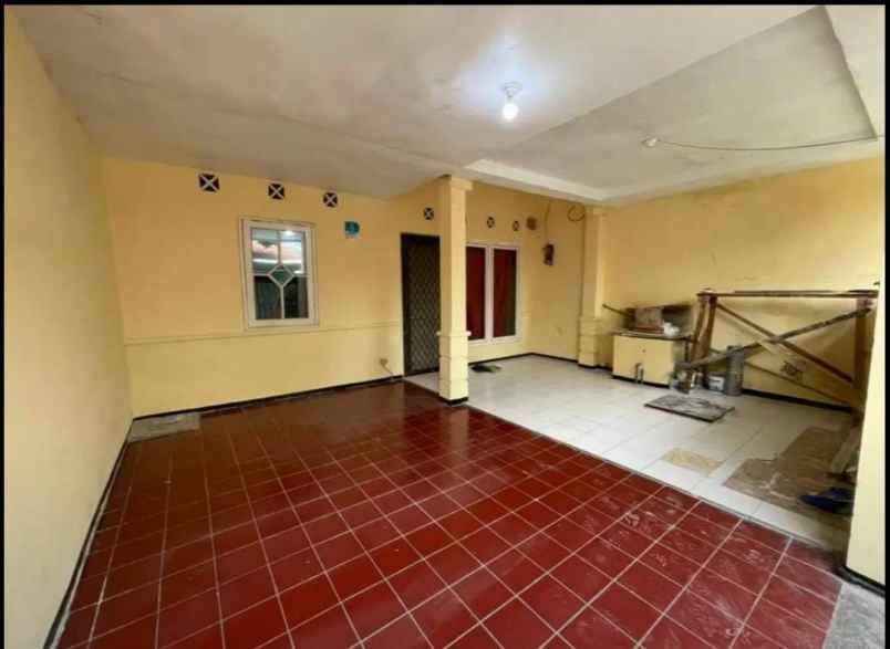 dijual rumah wiguna tengah