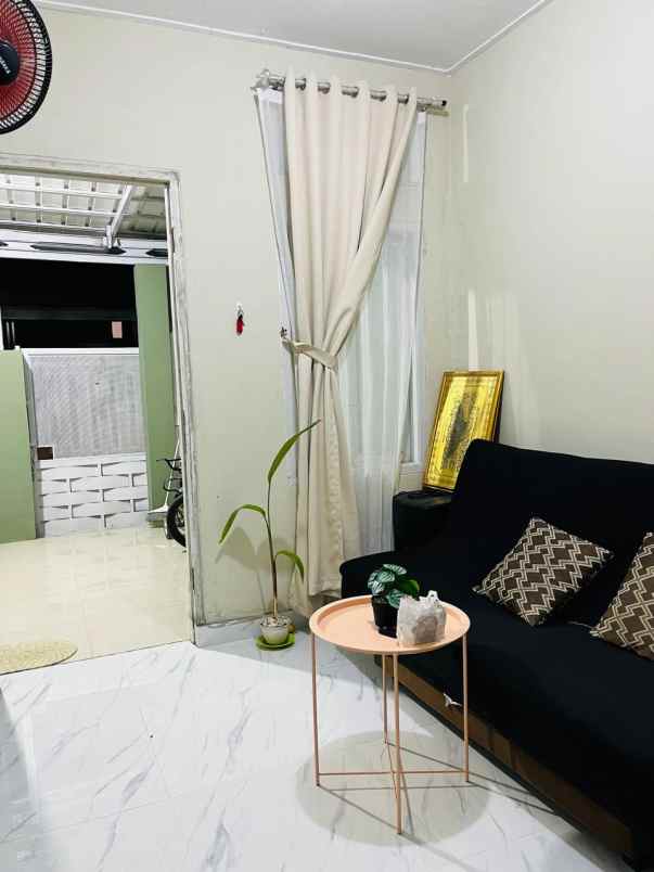 over kredit rumah grand sutera serang