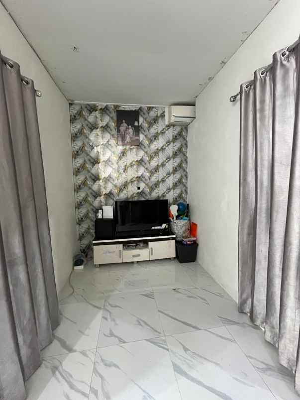 over kredit rumah grand sutera serang