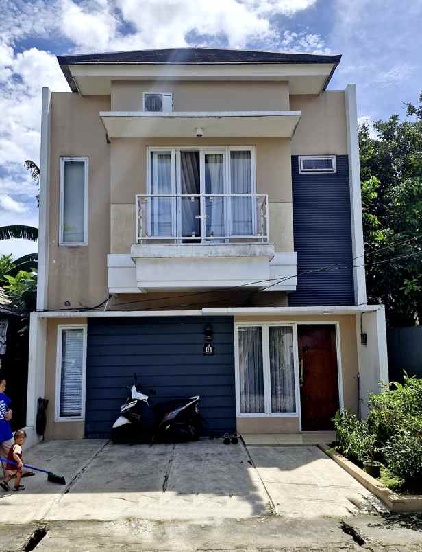 rumah cluster di lenteng agung dekat stasiun krl