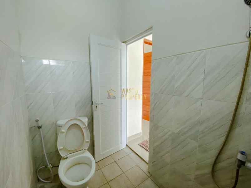 rumah modern dengan rooftop dekat jalan jogja solo