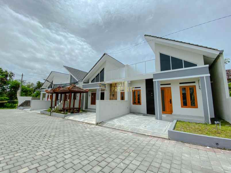 rumah modern dengan rooftop dekat jalan jogja solo