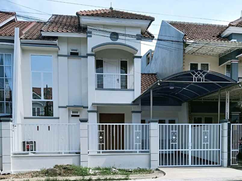 dijual rumah cluster harapan indah